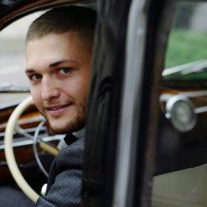 Handsome man in the car, businessman